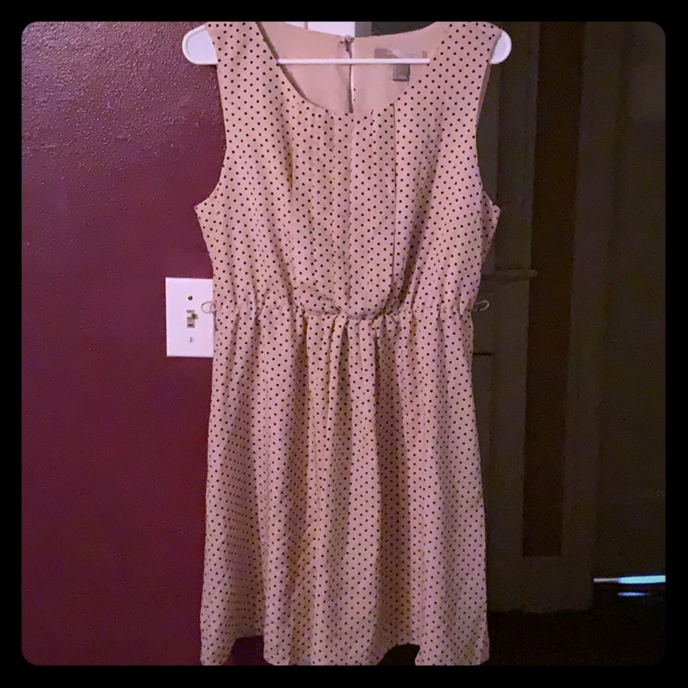 Light pink with black polka dot dress.